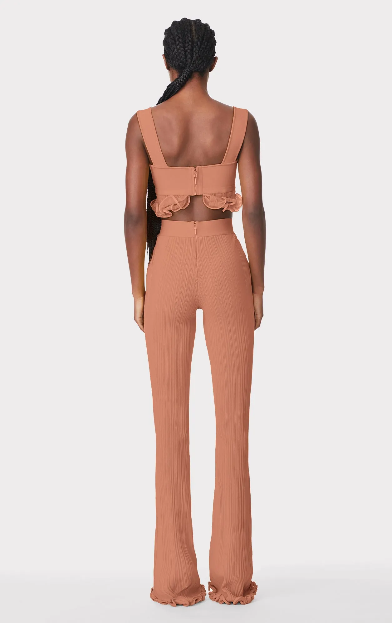 RIBBED PANTS WITH RUFFLED HEM