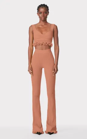 RIBBED PANTS WITH RUFFLED HEM
